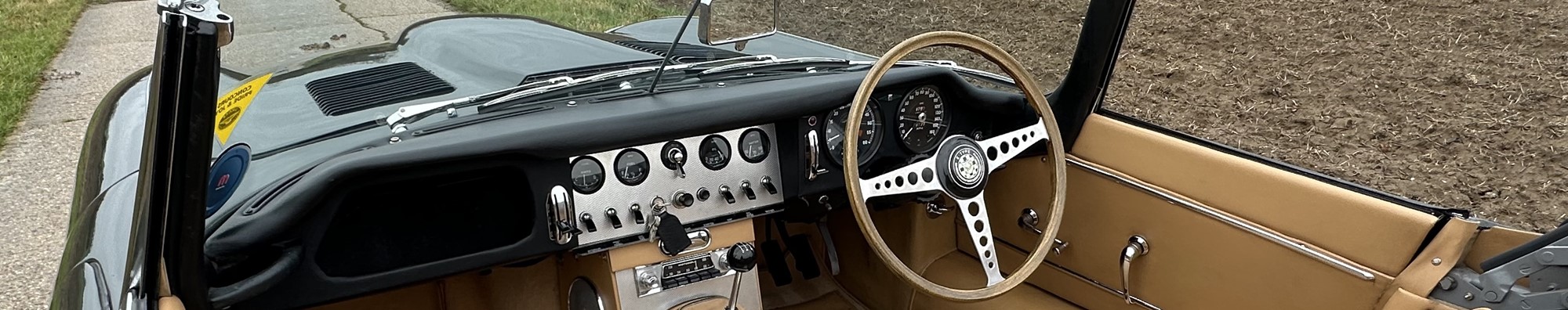 Iconic early E-Type motors into Reeman Dansie 